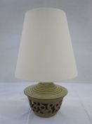 20th century lamp with studio pottery-style pierced base and cream shade