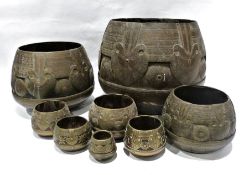 Set of 19th century or later Anglo-Indian grain measures, in various graduated sizes. (8)