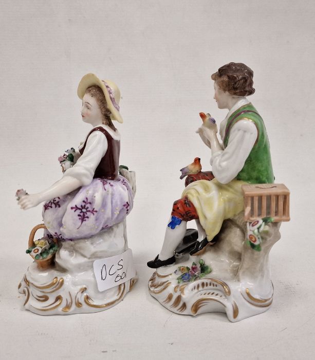 Pair continental porcelain figures of lady seated with flowers and basket of flowers at her feet, - Image 2 of 3