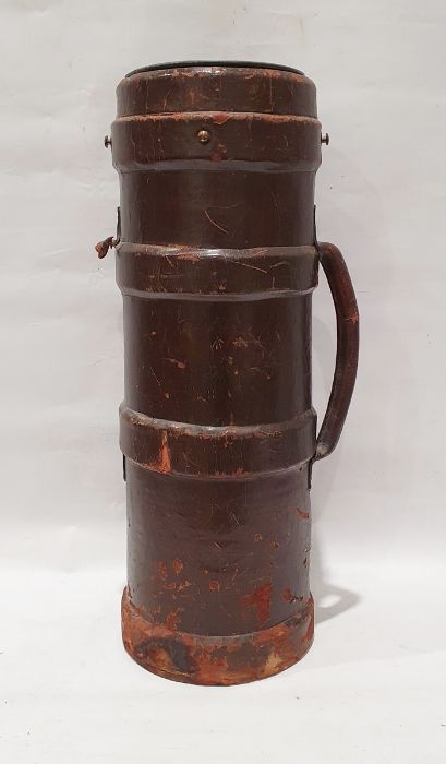 WWII leather artillery shell carrier marked 'J.A.H.', with carry handle and later liner for use as a