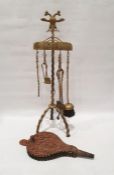 Brass fireside companion set, on a tripod stand surmounted by double headed eagle, possibly German /