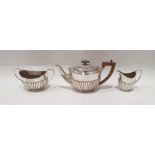 Edward VII silver three-piece tea service with half reeded decoration, London 1903 by Charles Stuart