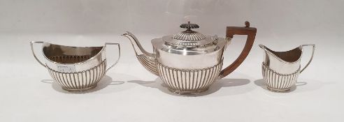 Edward VII silver three-piece tea service with half reeded decoration, London 1903 by Charles Stuart