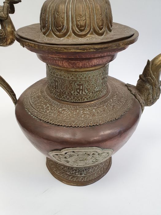 Late 19th century or later, Tibetan copper and brass fitted teapot, with Naga form handle. - Image 6 of 33