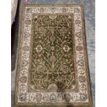 Modern Persian style green ground wool pile rug with floral pattern and palmette herati border 180cm