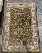 Modern Persian style green ground wool pile rug with floral pattern and palmette herati border 180cm