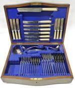 20th century oak serpentine-fronted canteen of electroplated cutlery