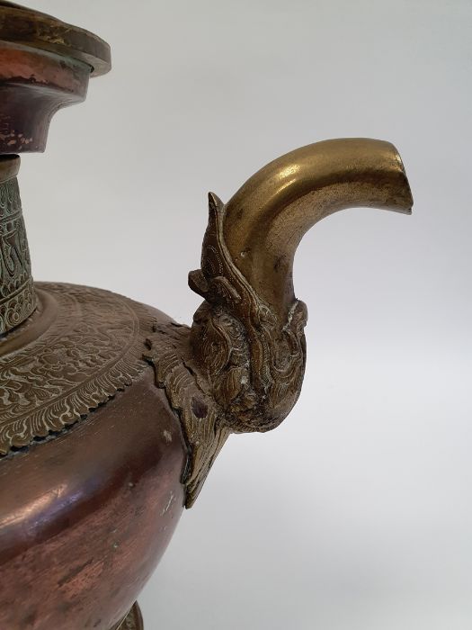 Late 19th century or later, Tibetan copper and brass fitted teapot, with Naga form handle. - Image 7 of 33