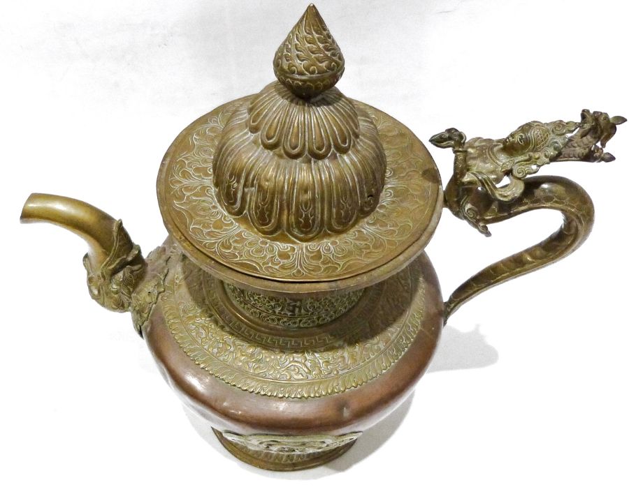 Late 19th century or later, Tibetan copper and brass fitted teapot, with Naga form handle. - Image 2 of 33