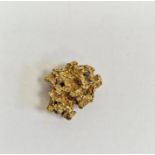 Gold nugget (valued as 9ct with metal inclusions), 7g approx.