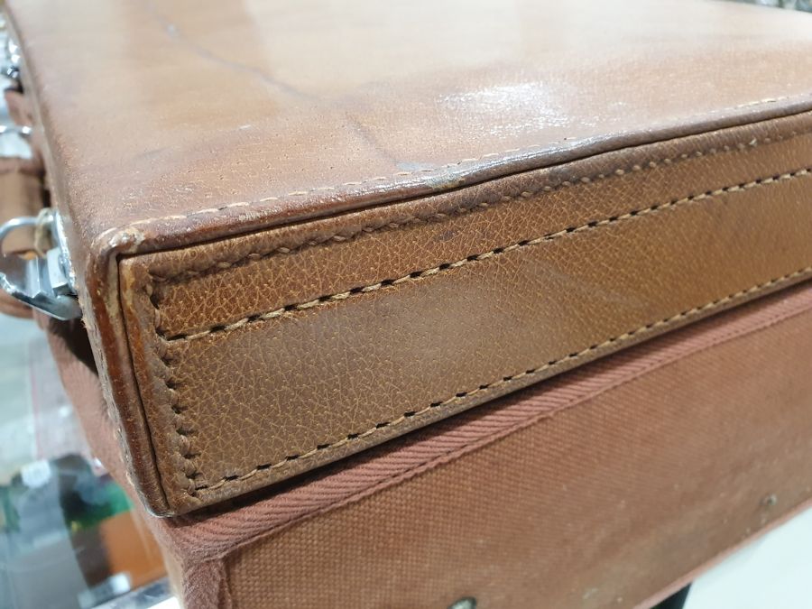 One large brown leather suitcase initialled 'J.C.E' with accompanying dust jacket (36cm x 56cm x - Image 5 of 7