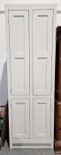Tall narrow four-door panelled cupboard painted grey, 70cm x 215cm Condition ReportDepth approx.