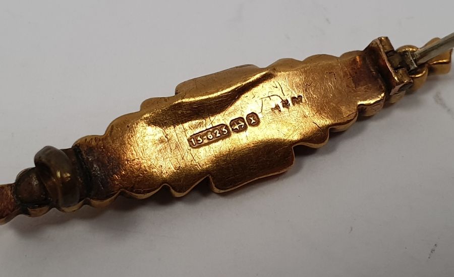 15ct gold shaped bar brooch, the central bar surrounded by applied scrollwork in Gieves Limited blue - Image 2 of 2