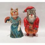 Pair of wooden carved and hand-painted novelty cat figures, to include ginger cat dressed in a dress