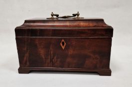 Rectangular box with decorative handle to top, hinged lid to reveal three compartments with