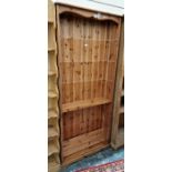 20th century pine open bookcase on squat bracket feet, 80cm x 180cm