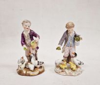 19th century Meissen figure of boy feeding ducks, on gilt scroll decorated circular base, 12cm