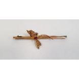 Gold-coloured metal dragonfly bar brooch set with seedpearls and oval cut ruby, unmarked