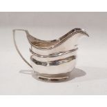 George III silver sauceboat with half-faceted decoration, on oval foot, London 1805, makers marks