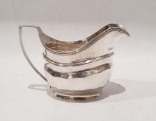 George III silver sauceboat with half-faceted decoration, on oval foot, London 1805, makers marks