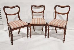 Set of six Victorian rosewood balloon-back chairs with drop-in seats, on turned and fluted front