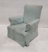 Victorian armchair in loose blue ground covers, turned front legs to brown china castors Condition