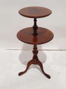 20th century two-tier occasional table in mahogany with satinwood banding, on turned supports,