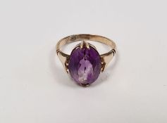 9ct gold and amethyst solitaire ring set oval facet-cut stone