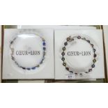 Two Coeur de Lion necklaces, both with matching earrings and in original boxes (2)