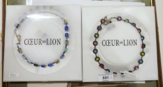 Two Coeur de Lion necklaces, both with matching earrings and in original boxes (2)