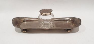 George V silver and glass inkwell on silver stand, London 1912 by Stokes & Ireland Ltd and a