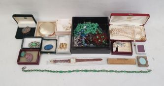 Large quantity of costume jewellery to include bead necklaces, brooches, compacts, jewellery box,