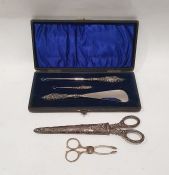 Silver sugar nips, silver-handled and sheathed scissors and silver-handled and steel bladed button