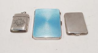 Silver and enamel cigarette case with gilt washed interior, a silver vesta case and one further