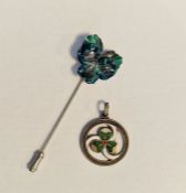 Silver and enamelled trefoil pendant with white, green and red enamelling and an enamelled floral