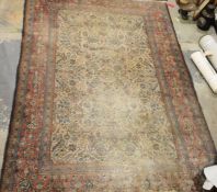 Persian herati-type rug, the cream ground with allover foliate decoration to the central field, on a