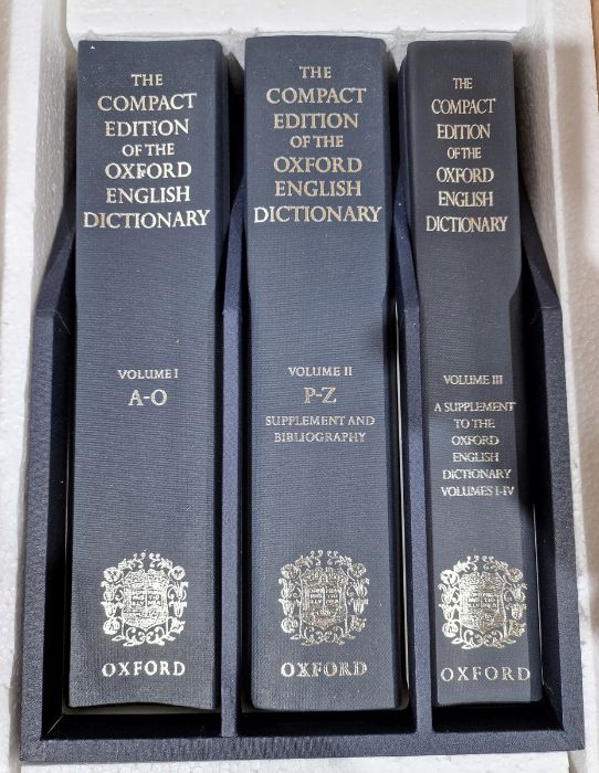 The Compact Edition of the Oxford English Dictionary, 3 vols within a fitted slip case, unread, A