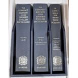 The Compact Edition of the Oxford English Dictionary, 3 vols within a fitted slip case, unread, A