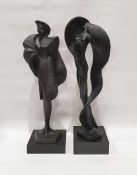 Two modern sculptures of female figures. One with hat and detailed shawl signed and dated to plinth