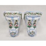 Pair 19th century continental porcelain wall brackets, each with foliate scroll base, relief