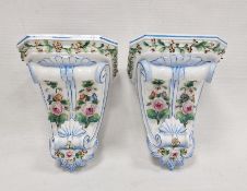 Pair 19th century continental porcelain wall brackets, each with foliate scroll base, relief