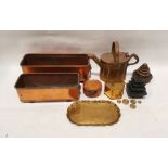 Two copper troughs with lion head knocker handles and claw feet and an assortment of weights, a