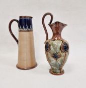 Doulton Lambeth stoneware jug, circular and tapered with stylised foliate jewelled border, 23cm high