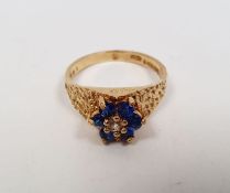 9ct gold, blue and white stone cluster ring with bark-pattern shoulders