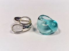 Baccarat silver and clear glass crossover ring, cased and a Baccarat turquoise glass ring, cased (2)