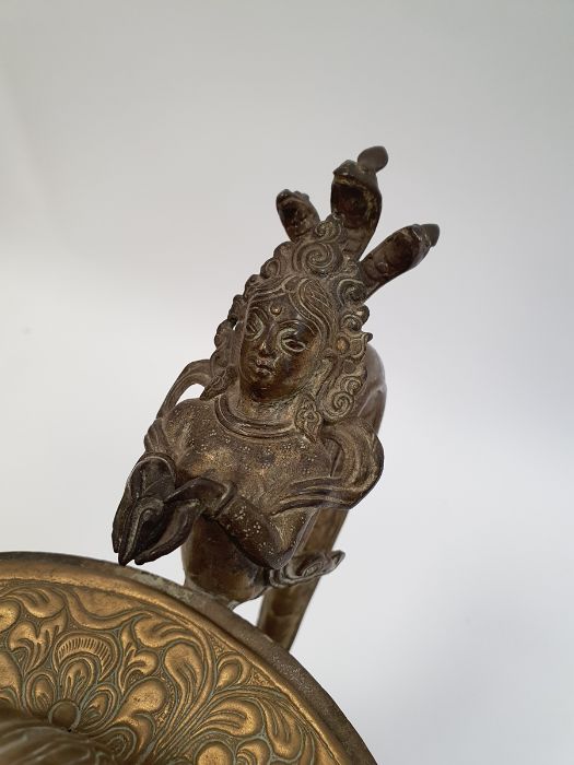 Late 19th century or later, Tibetan copper and brass fitted teapot, with Naga form handle. - Image 15 of 33