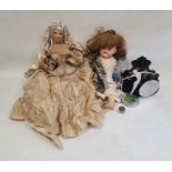 Art Deco style gong, cloth headed doll, china headed doll marked Melitta, and a painted folding