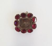 Victorian gold-coloured metal and almandine garnet mourning hair brooch, the rectangular central
