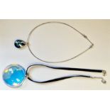 Baccarat silver and blue/green iridescent glass pendant, cased and a Baccarat blue glass disc