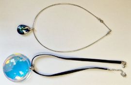 Baccarat silver and blue/green iridescent glass pendant, cased and a Baccarat blue glass disc